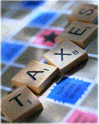 A Scrabble Board With The Letter Tiles Spelling The Word Taxes